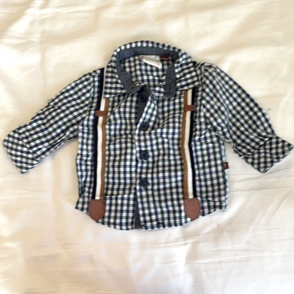 Amazing button down shirt by Axel and Hudson with leather detail on suspenders